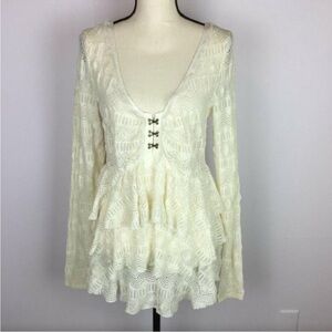 White blouse with tiered ruffles